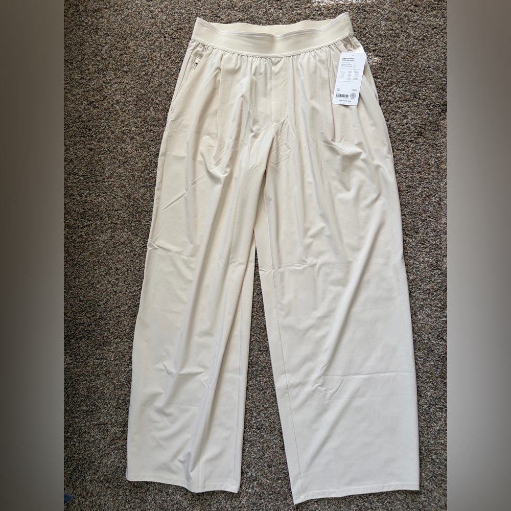 Athleta Stratosphere Wide Leg Cream Pants. Brand new with tags